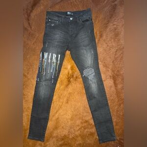AMIRI Black Distressed Skinny Jeans with Colorful Accents